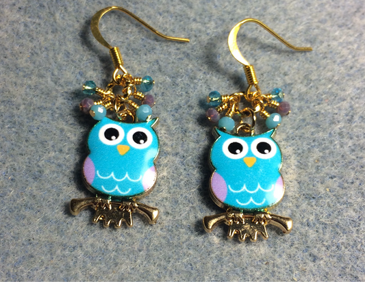 Turquoise, lavender, and white enamel owl charm earrings adorned with tiny dangling turquoise and lavender Chinese crystal beads.