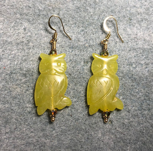 Large green serpentine gemstone owl bead earrings adorned with olive green Chinese crystal beads.