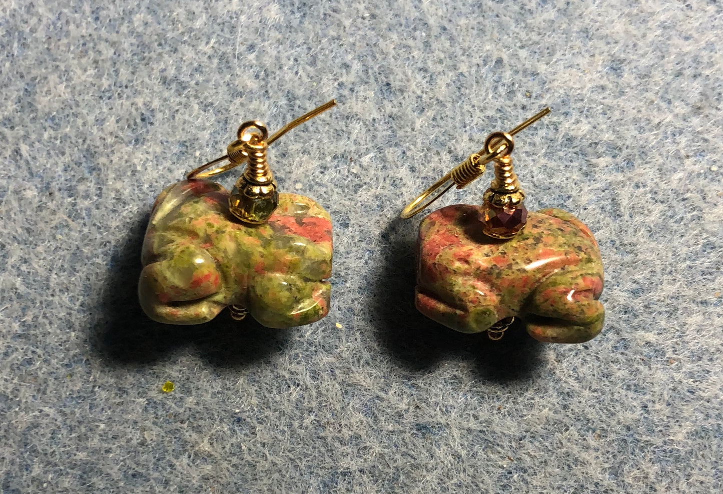 Orange and green unakite gemstone frog bead earrings adorned with sparkly green Chinese crystal beads.