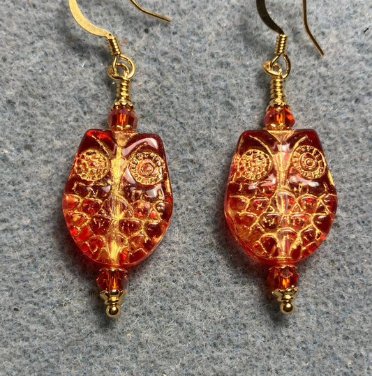 Sparkly orange (with gold wash) Czech glass owl bead earrings adorned with orange Chinese crystal beads.
