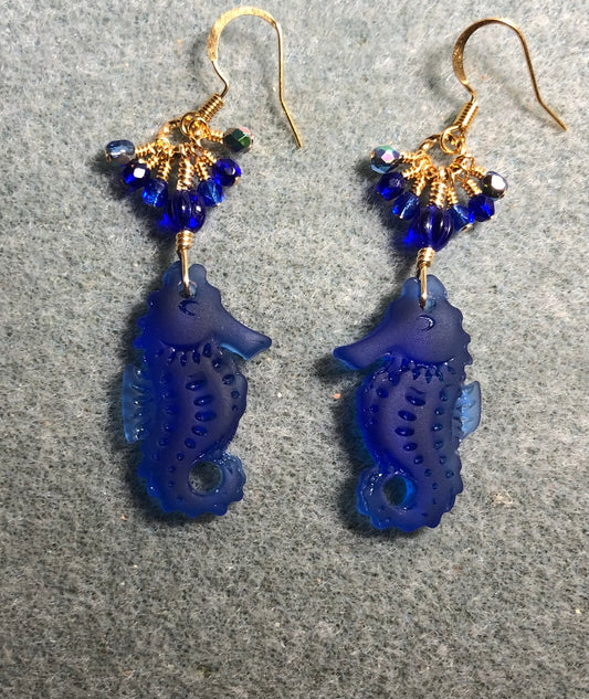 Dark blue sea glass seahorse pendant bead earrings adorned with dark blue Czech glass beads and tiny dangling dark blue Czech glass beads.