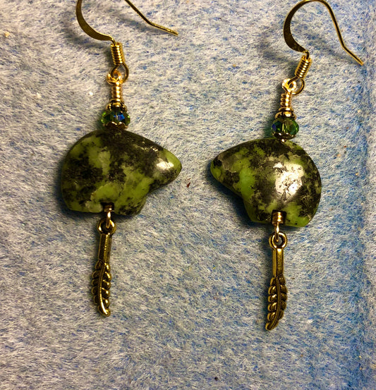 Green African jade gemstone Zuni bear fetish bear earrings adorned with green crystal beads and tiny gold feather charms.