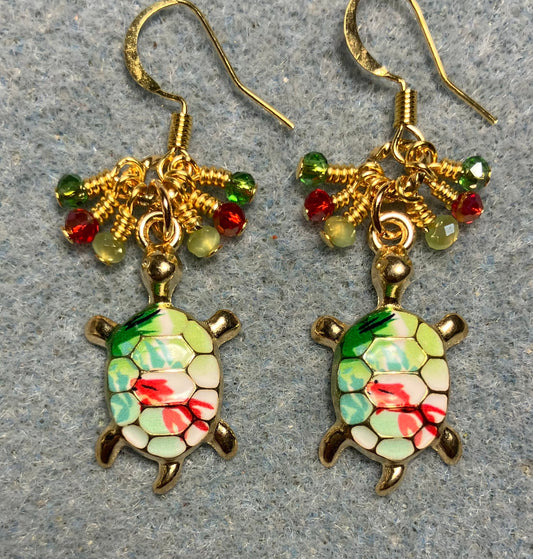Green and red enamel turtle charm earrings adorned with tiny dangling dark green, red, and light green Chinese crystal beads.