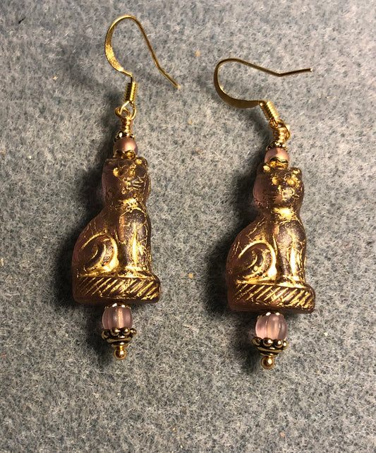 Translucent pink (with gold inlay) fancy Czech glass cat bead earrings adorned with light pink Czech glass beads.
