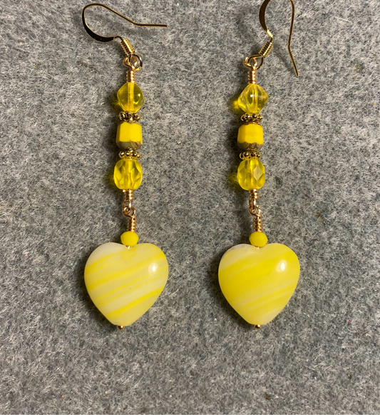 Bright yellow Czech glass heart bead earrings adorned with yellow Czech glass beads.