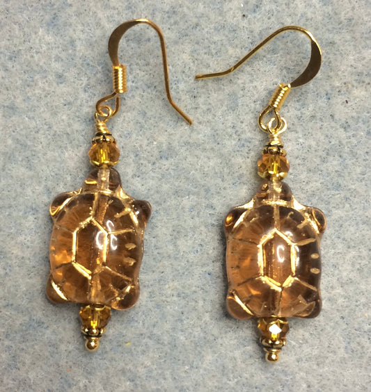 Topaz brown (with gold inlay) Czech glass turtle bead earrings adorned with topaz Chinese crystal beads.