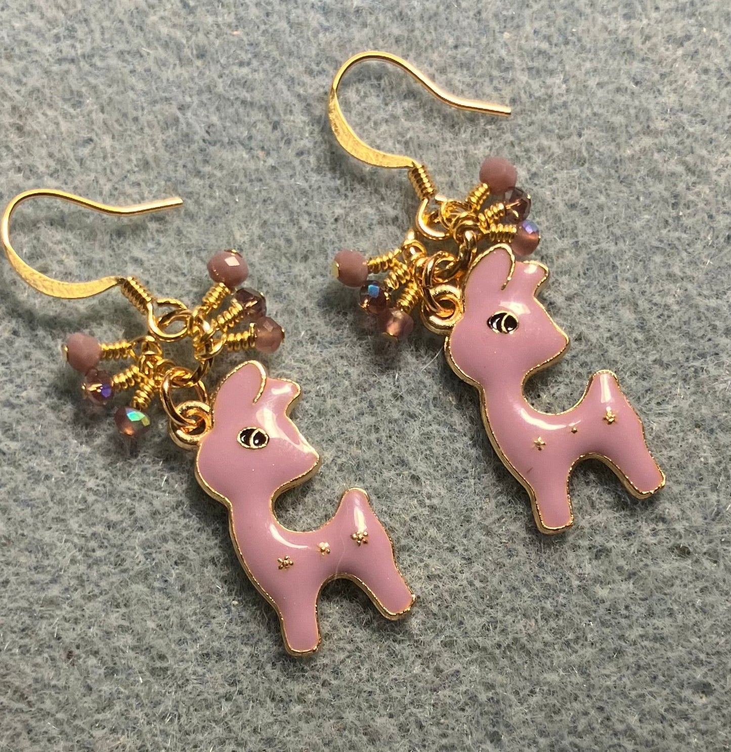 Lavender enamel deer charm earrings adorned with tiny dangling lavender Chinese crystal beads.