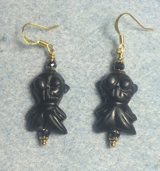Carved black gemstone goldfish bead earrings adorned with black Chinese crystal beads.