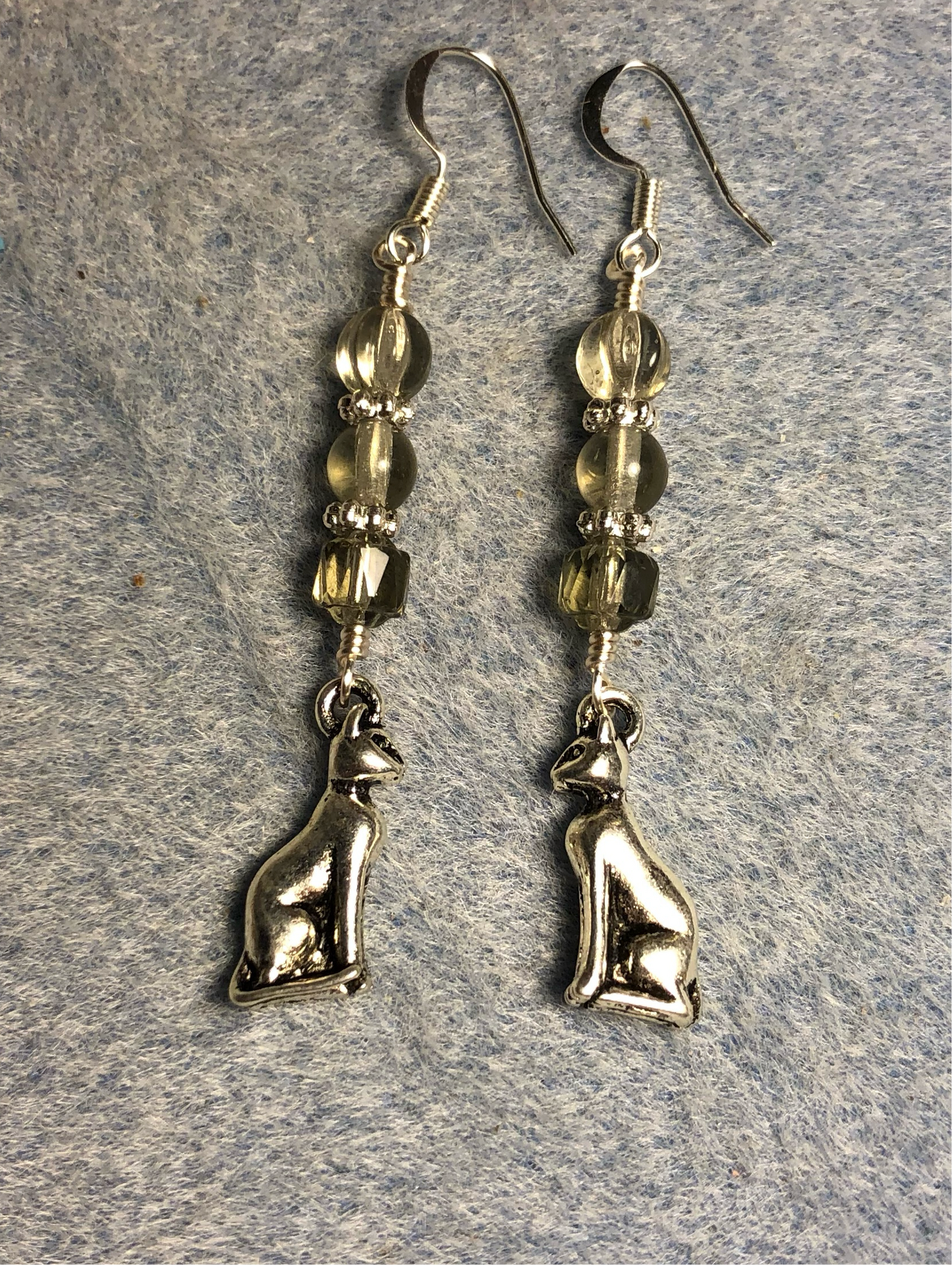 Silver Egyptian cat charm earrings adorned with gray Czech glass beads
