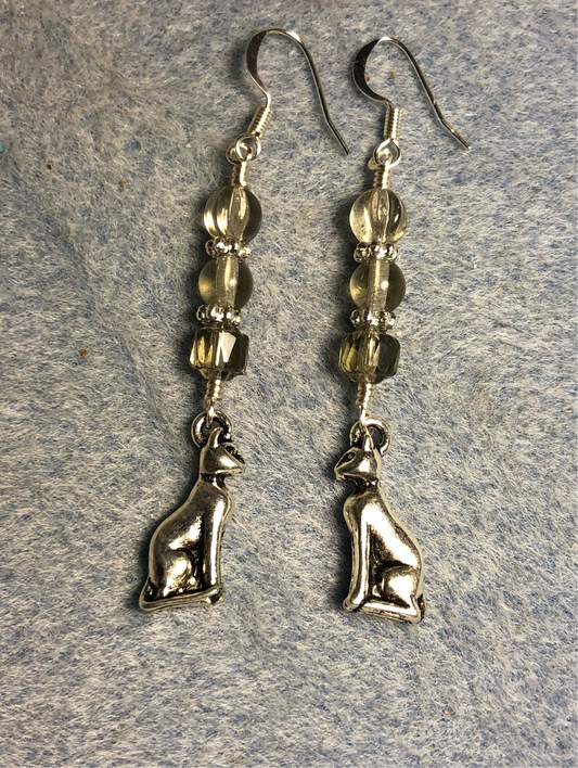Silver Egyptian cat charm earrings adorned with gray Czech glass beads