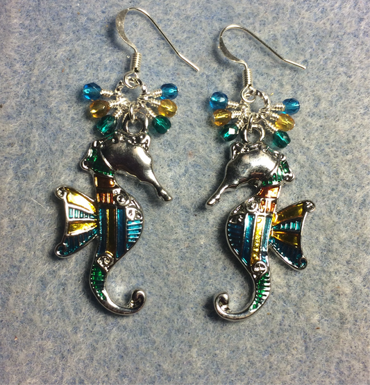 Large turquoise, amber, and teal enamel seahorse charm earrings adorned with small dangling turquoise, amber, and teal Czech glass beads.