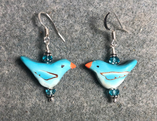 Light turquoise polymer clay bird bead earrings adorned with turquoise Chinese crystal beads.
