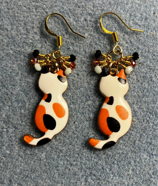 Orange, white, and black enamel calico cat charm earrings adorned with tiny dangling orange, white, and black Chinese crystal beads.