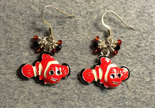 Red, black, and white enamel striped fish charm earrings adorned with tiny dangling red and black Chinese crystal beads.