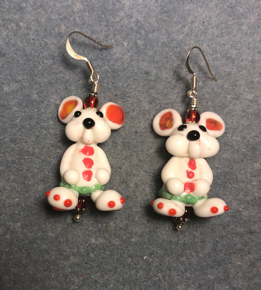 Large white, red, and green lamp work bunny rabbit bead earrings adorned with red Czech glass beads.
