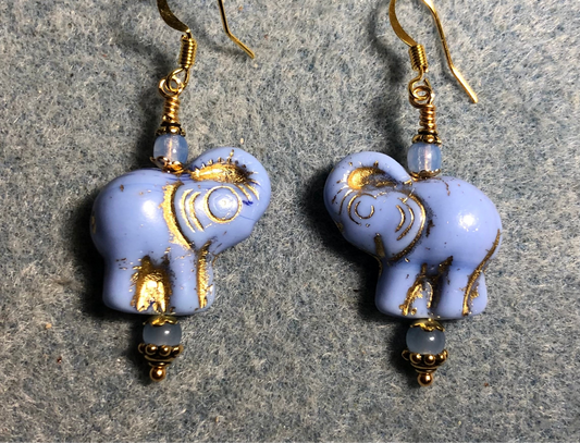 Light blue (with gold inlay) Czech glass elephant bead earrings adorned with light blue Czech glass beads.