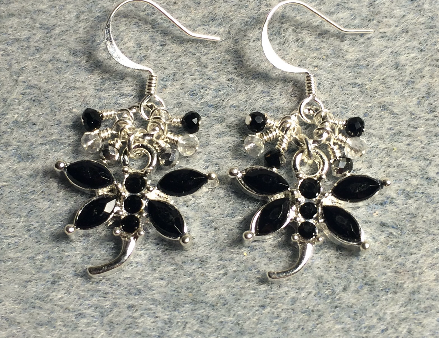 Black and silver rhinestone dragonfly charm earrings adorned with tiny dangling black and clear Chinese crystal beads.