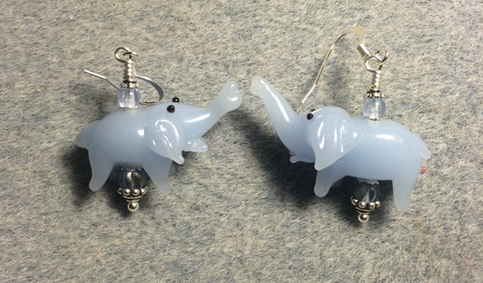 Opaque light blue lamp work elephant bead earrings adorned with light blue Czech glass beads.