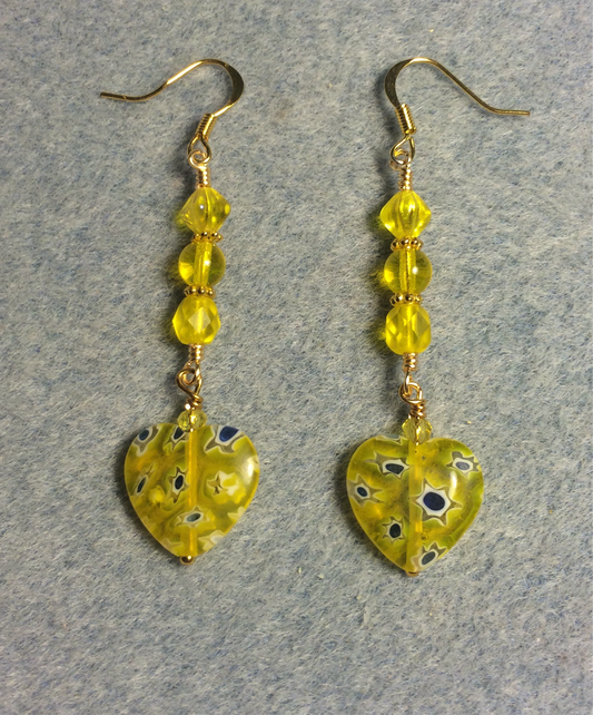 Yellow millefiori Czech glass heart bead earrings adorned with yellow Czech glass beads.