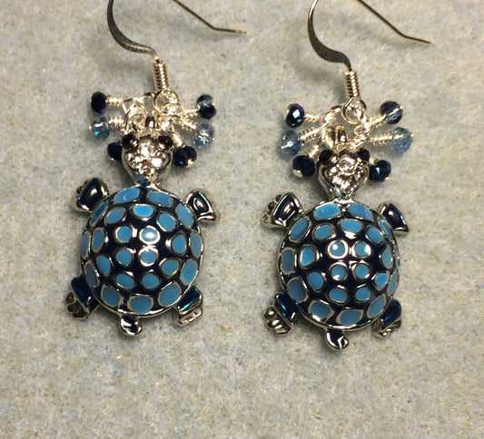 Dark blue and light blue enamel mosaic turtle charm earrings adorned with tiny dangling dark blue and light blue Chinese crystal beads.