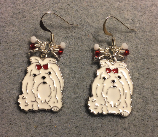 White and red enamel Shih Tzu dog charm earrings adorned with tiny dangling white, silver, and red Chinese crystal beads.