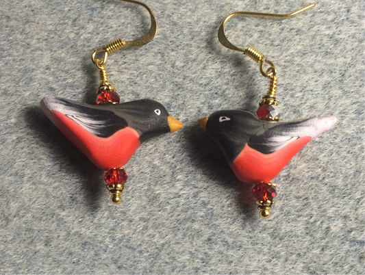 Red and black polymer clay bird bead earrings adorned with red Chinese crystal beads.