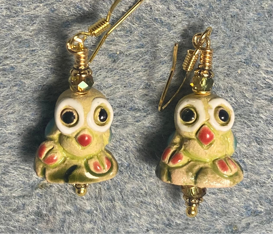 Small olive green ceramic owl bead earrings adorned with sparkly olive green Chinese crystal beads.