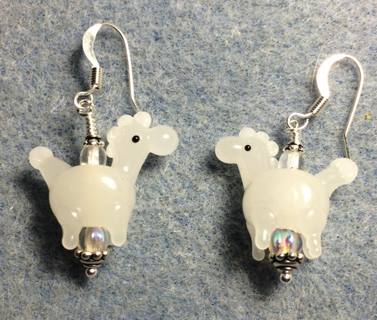 Opaque milky white lamp work horse bead earrings adorned with clear Czech glass beads.