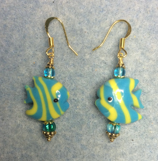 Turquoise and yellow lamp work angelfish bead earrings adorned with turquoise Czech glass beads.