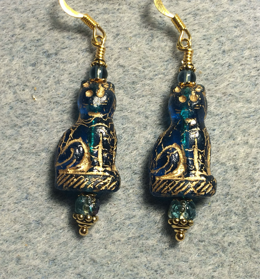 Translucent dark turquoise (with gold inlay) fancy Czech glass cat bead earrings adorned with dark turquoise Czech glass beads.