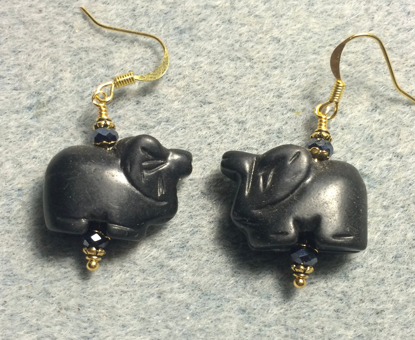 Black onyx gemstone elephant bead earrings adorned with black Chinese crystal beads.