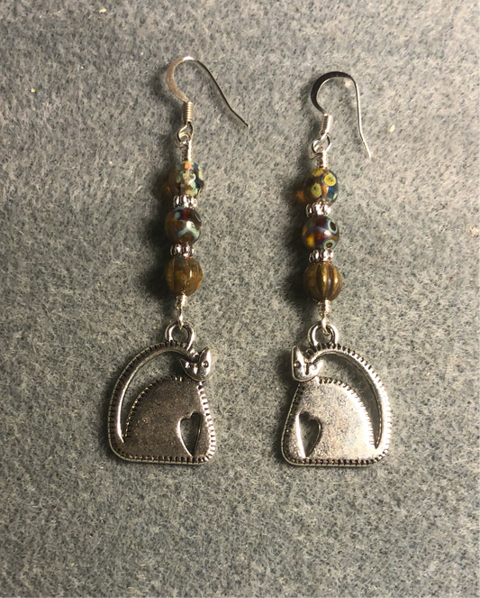 Silver cat charm earrings adorned with Picasso brown Czech glass beads.