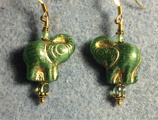 Green (with gold inlay) Czech glass elephant bead earrings adorned with green Czech glass beads.