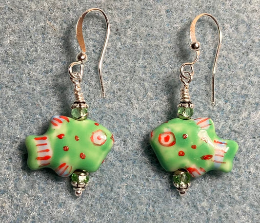 Small green with red spots ceramic fish bead earrings adorned with green Chinese crystal beads.