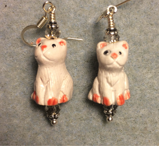 Small white ceramic cat bead earrings adorned with clear Chinese crystal beads.