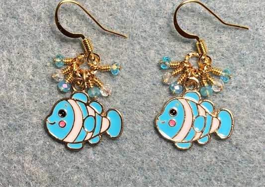 Turquoise and white enamel striped fish charm earrings adorned with tiny dangling turquoise and clear Chinese crystal beads.