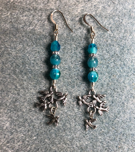 Silver flock of birds charm earrings adorned with milky turquoise Czech glass beads