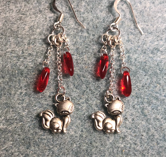 Small silver fox charm earrings attached to silver chain and adorned with small red Czech glass dagger beads