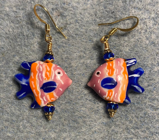 Orange, dark blue, and pink ceramic angelfish bead earrings adorned with dark blue Chinese crystal beads.