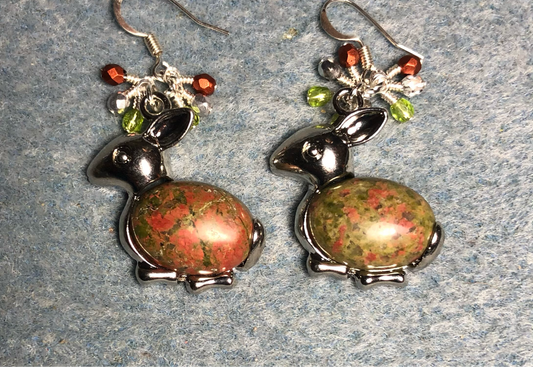 Large silver and orange and green unakite gemstone rabbit charm earrings adorned with small dangling orange, green, and silver Czech glass beads.