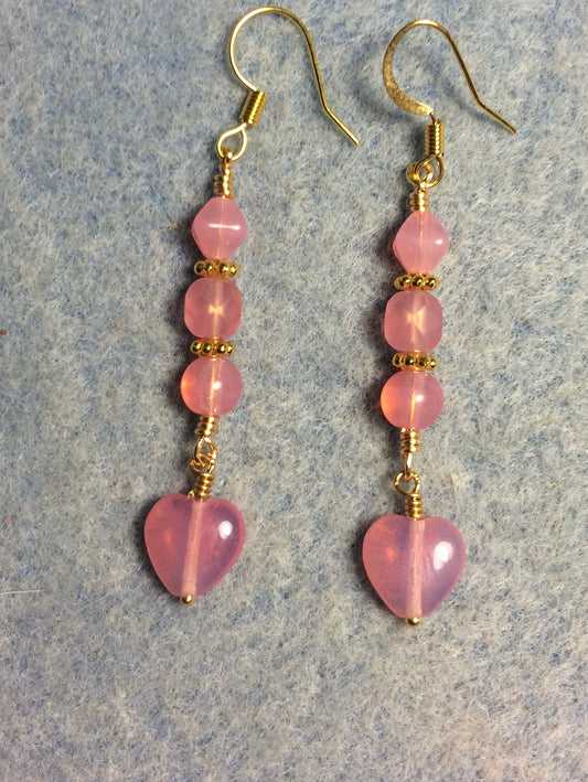 Small opaque pink Czech glass heart bead earrings adorned with opaque pink Czech glass beads.