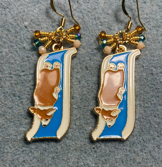 Brown and white enamel corgi charm earrings adorned with tiny dangling white, blue, and amber Chinese crystal beads.