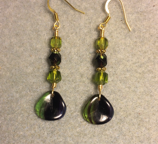 Green and purple Czech glass rose petal earrings adorned with green and purple Czech glass beads.