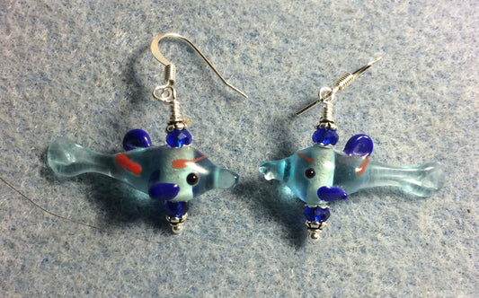 Small translucent light blue and dark blue lamp work fish bead earrings adorned with dark blue Chinese crystal beads.