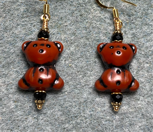 Opaque brown (with black inlay) Czech glass teddy bear bead earrings adorned with black Chinese crystal beads.