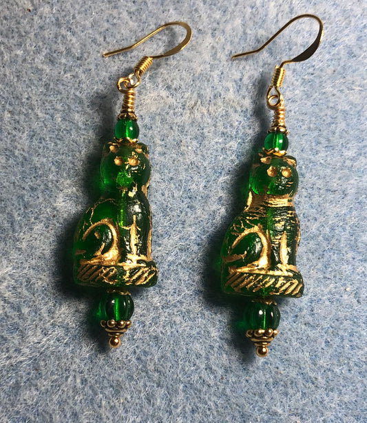 Emerald green (with gold inlay) fancy Czech glass cat bead earrings adorned with emerald green Czech glass beads.
