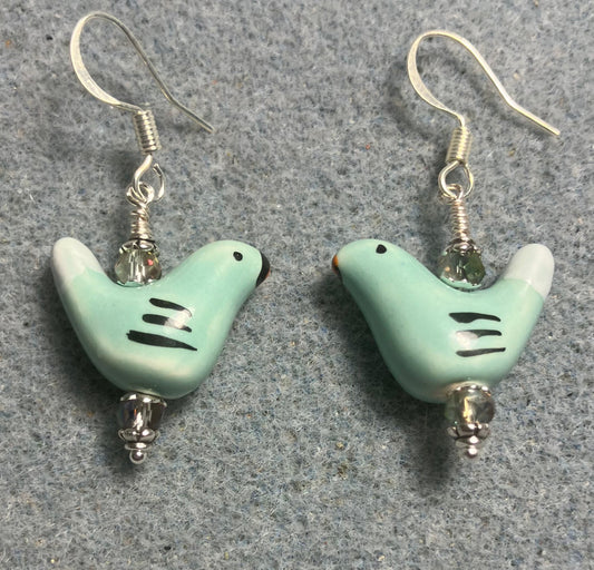 Small light green and white ceramic bird bead earrings adorned with light green Chinese crystal beads.