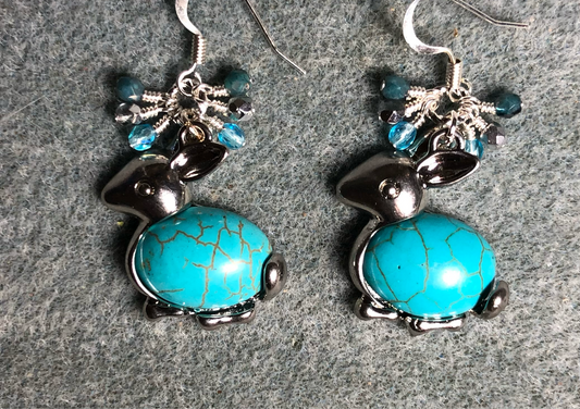Large silver and turquoise  gemstone rabbit charm earrings adorned with small dangling turquoise and silver Czech glass beads.