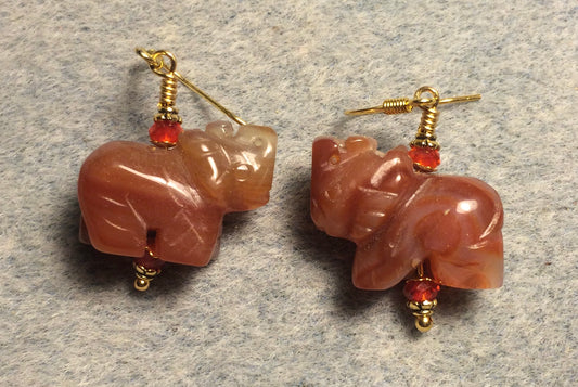 Red onyx agate gemstone elephant bead earrings adorned with orange Chinese crystal beads.