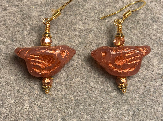 Orange (with copper wash) Czech glass bird bead earrings adorned with gold Chinese crystal beads.